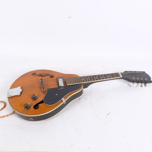 264 - COLUMBUS - a Vintage 1960s Columbus electro acoustic arch-top mandolin, no identifiable labels or se... 