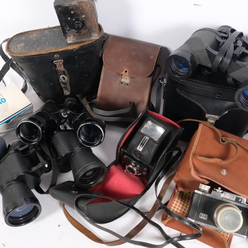 282 - A selection of Vintage cameras and binoculars, including an Ensign Ful-vue, a Boots Fleet Zoom 7-15x... 