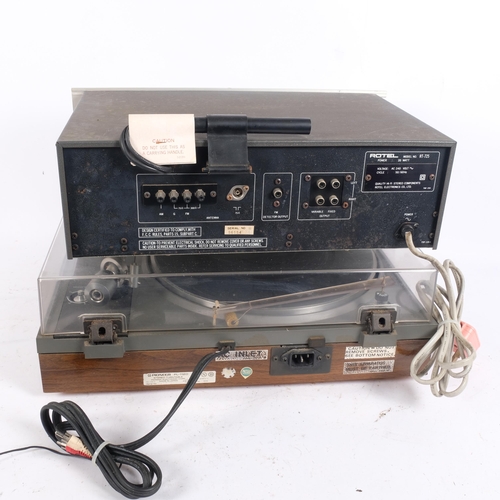 287 - A Pioneer belt drive stereo turntable, PL-112D, and a Rotel AM/FM stereo tuner, RT-725 (2)