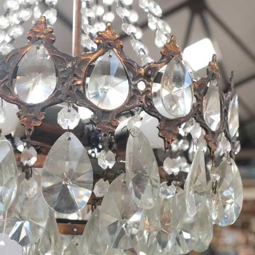 293 - An Empire style ornate crystal balloon chandelier, with glass lustres, overall drop approx 60cm