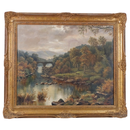 319 - A large oil on canvas, woodland landscape scene, river running under railway bridge, signed bottom r... 