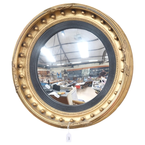 341 - A large Regency style giltwood convex wall mirror, with boss ball decoration, diameter approx 58cm