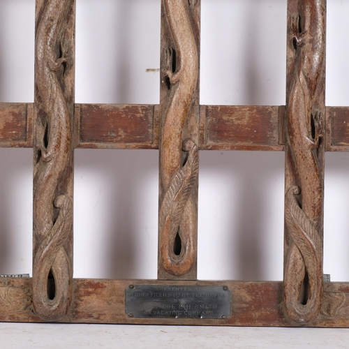 342 - A hardwood carved card rack, presented to the officers of the 1st Battalion Buffs (Royal East Kent R... 