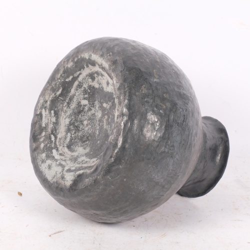 373 - A heavy hammered lead Ethnic pouring vessel, H19cm