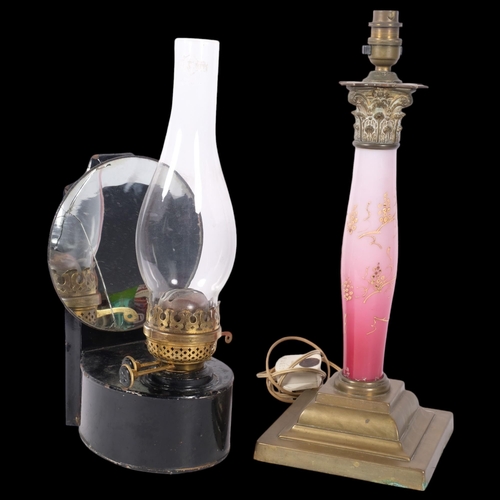 390 - An early 20th century brass and pink glass lamp, 42cm overall, and a Victorian paraffin lamp with at... 