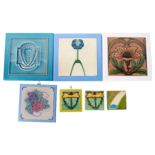 412 - A selection of Art Nouveau style ceramic tiles, various floral decorations, each in modern wooden-ca... 