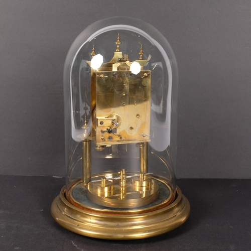 416 - A brass clock under glass dome, H25cm