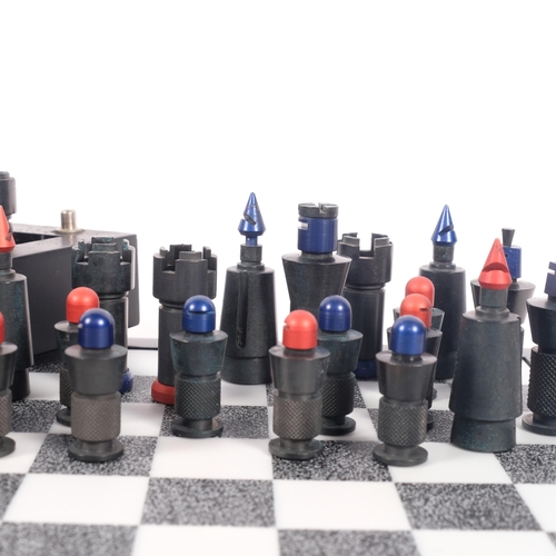 431 - Unusual Le Breton travelling chess set, awarded as a prize at a chess match, board size 27cm across