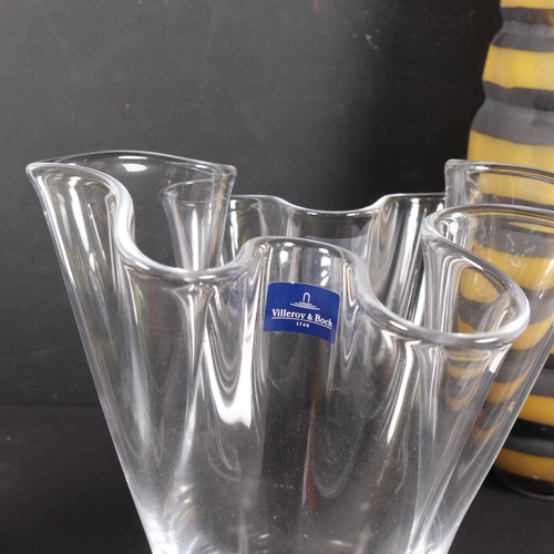 437 - A Villeroy & Boch clear glass vase with wavy rim, H23cm, a mottled orange vase, and 2 similar ribbed... 