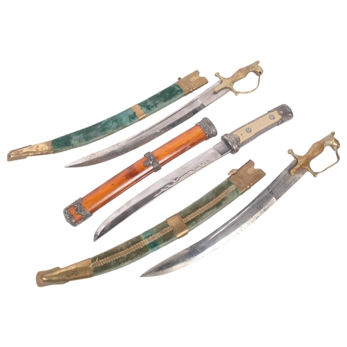 542 - 2 Indian short swords with brass tiger design handle and scabbards, together with reproduction Japan... 