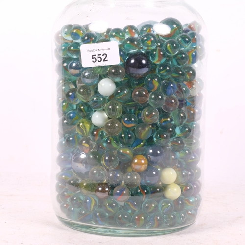 552 - A jar of Vintage glass marbles