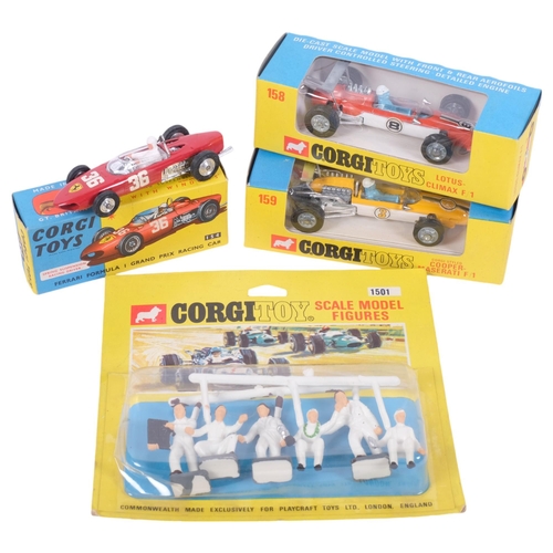 560 - 3 boxed Corgi racing cars, and model figures