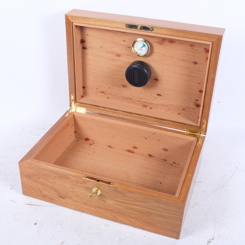 564 - A French satinwood humidor, 35cm x 24cm