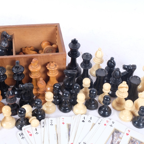 570 - A boxwood chess set, King height 8cm, and a composition chess set, King height 9.5cm