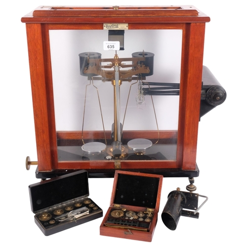 3073 - A mahogany-cased set of brass balance scales, by Gertling of London, on stand, together with 2 sets ... 