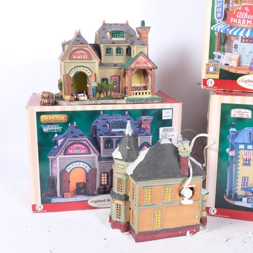 470 - Lemax lamps modelled as illuminated buildings, and a model horse and cab