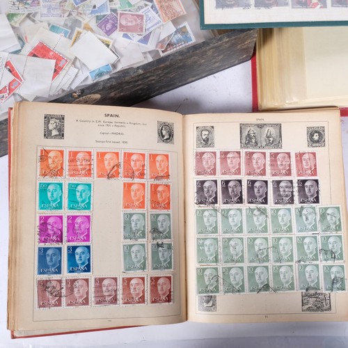 467 - A box containing world stamp albums, etc