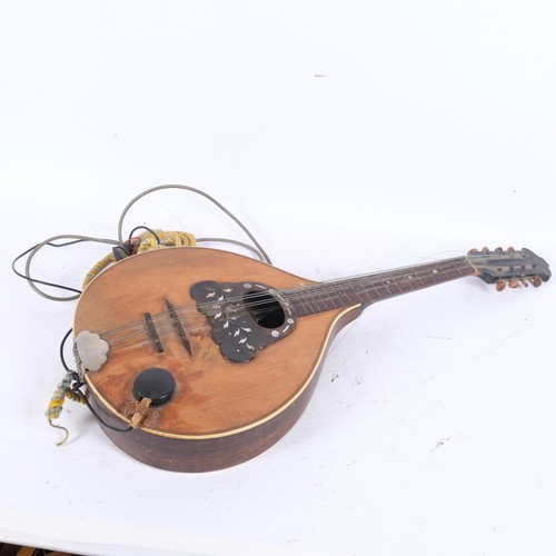 264A - A Vintage 1960s electro acoustic mandolin, possibly German, with decorative inlaid mother-of-pearl d... 