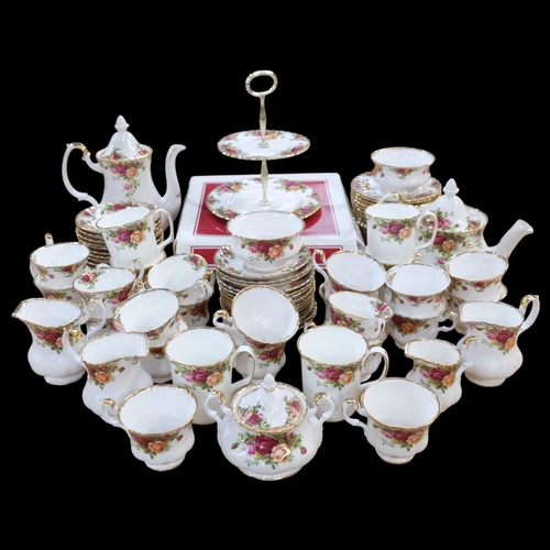 613 - Extensive Royal Albert Old Country Roses tea service, matching mugs, and 2 cake stands