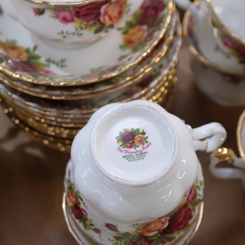 613 - Extensive Royal Albert Old Country Roses tea service, matching mugs, and 2 cake stands