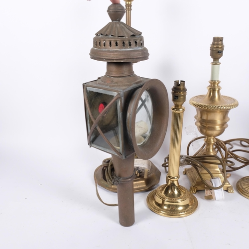 632 - A Classical design brass table lamp on tripod base, 68cm, 4 other brass table lamps, and a porch lan... 