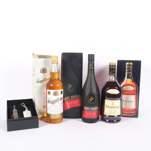 640 - Boxed Hennessy Privilege Cognac, Remy Martin Cognac, and a quantity of miniatures, etc