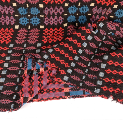 659 - A multi-coloured reversible Welsh wool blanket (A/F), 224cm x 186cm