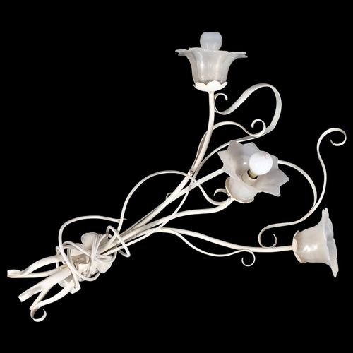 677 - A 3-branch wrought-metal painted wall light, with shades in the form of flowers, H75cm