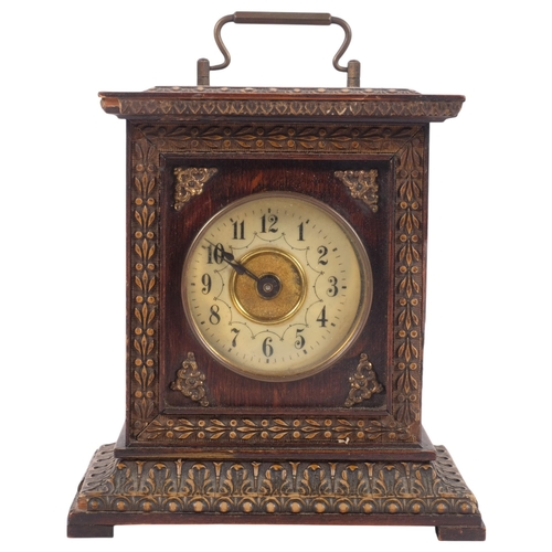 686 - A Vintage mantel clock with key in acanthus carved case, H17cm