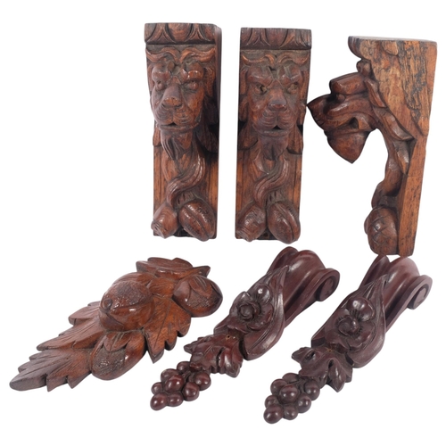 690 - A group of 3 x 19th century carved lion corbel bracket supports, and a selection of similar carved s... 