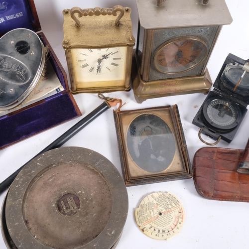 701 - A group of interesting items, including various carriage clocks, an Antique daguerrotype, a silver-m... 