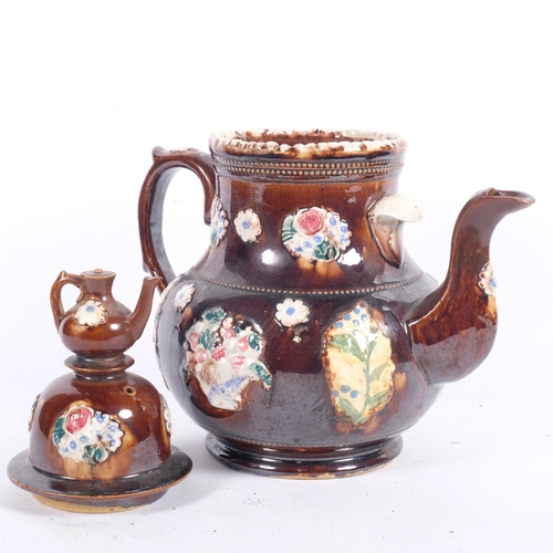 702 - An Antique Barge Ware teapot, with motif 