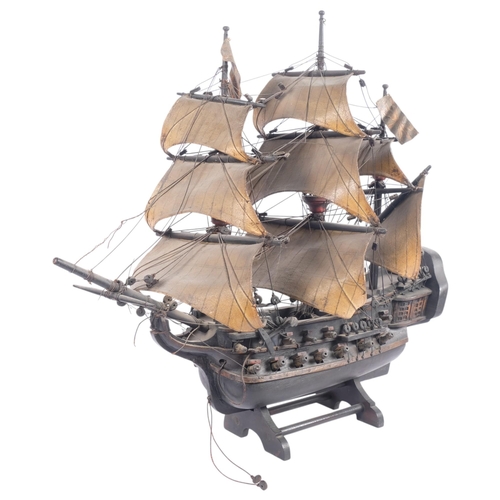 708 - A scratch-built wooden galleon ship, with 3 masts, and associated wooden stand, L68cm, H68cm