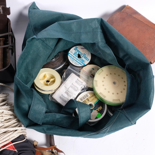 710 - A selection of Vintage and other fishing equipment and accessories, including a leather Hardy Brothe... 