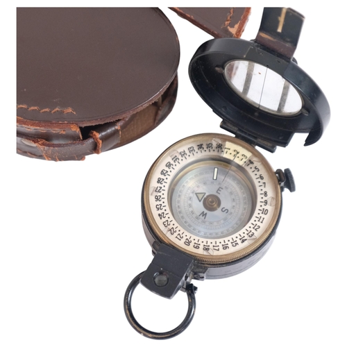 689 - M D S Ltd, London, A 20th century compass with original leather case