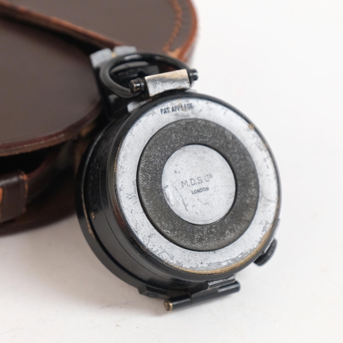 689 - M D S Ltd, London, A 20th century compass with original leather case