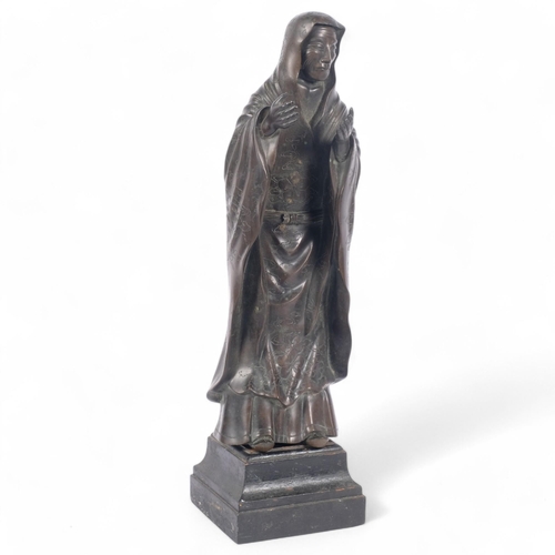 13 - A Chinese bronze figure of a sage, with engraved prunus decoration, on stained wood stand, figure he... 