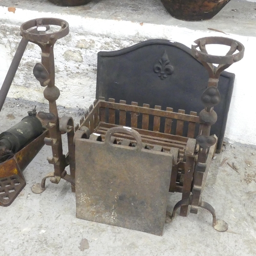 2638 - A cast iron fire back, width 58cm, height 44cm, a ducks nest fire grate, a pair of fire dogs etc.