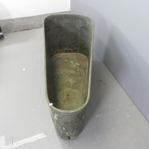 2642 - A zinc lined copper bath, raised on casters. Length 131cm, height 73cm, width (widest) 58cm..