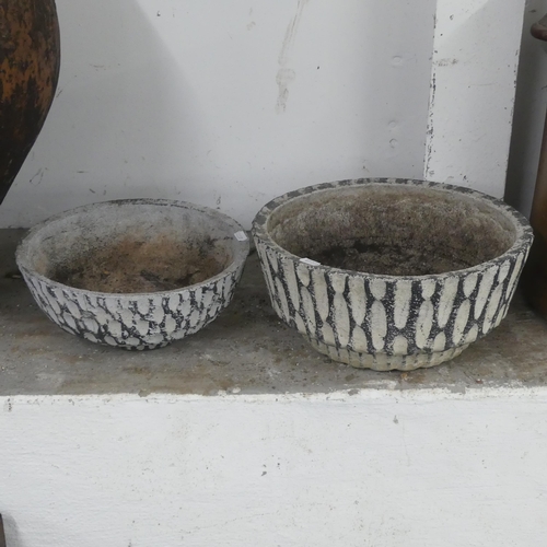 2643 - Two similar composite garden bowl ornaments. Largest diameter 34cm, height 16cm.