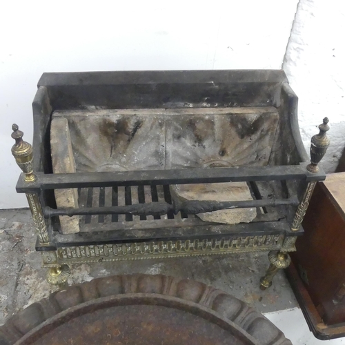 2645 - A painted rectangular cast iron fire grate with brass mounts. Width 50cm, height 50cm, depth 22cm.