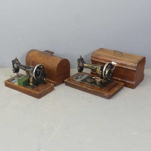 2648 - A vintage cased Singer sewing machine, and a cased German Frister & Rossmann sewing machine. (2)... 