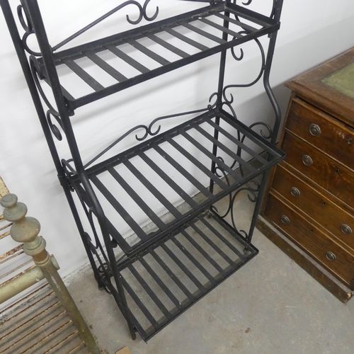 2661 - A modern painted metal four-tier plant rack. Width 60cm, height 165cm, depth 32cm.