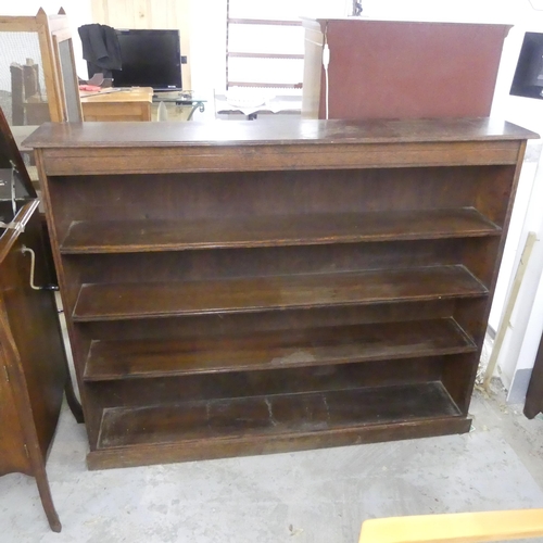 2675 - A vintage oak open bookcase, with four fixed shelves. Width 152cm, height 122cm, depth 27cm.