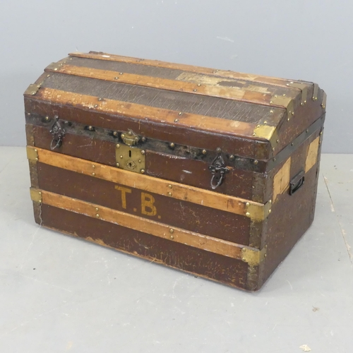 2689 - A Victorian dome top trunk. Width 76cm, height 51cm, depth 45cm.