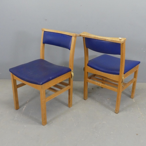 2692 - A set of four beech and faux-leather upholstered chapel chairs.