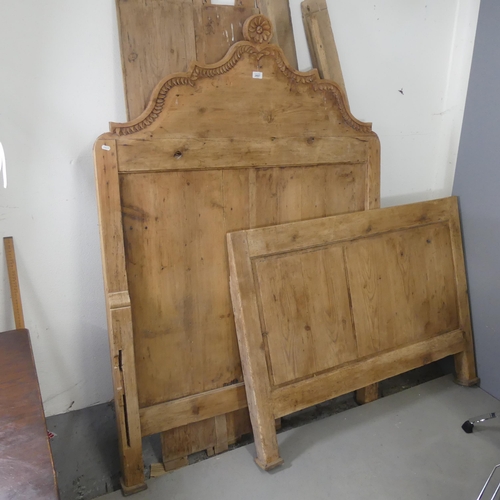 2697 - A vintage pine 4' small double bed, comprising head and foot boards and side rails. Headboard dimens... 