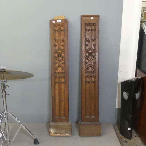 2702 - Two Arts and Crafts style carved oak columns, originally from a mantelpiece. Tallest width 22cm, hei... 