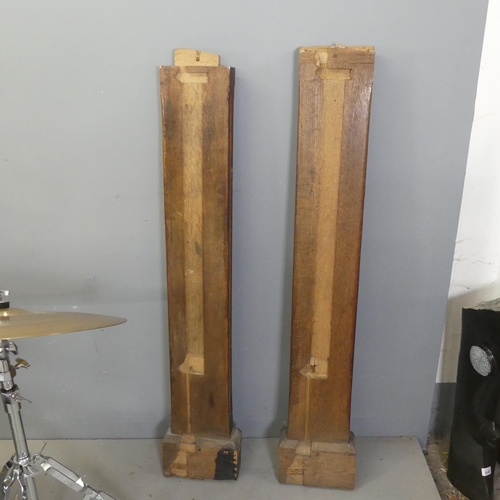 2702 - Two Arts and Crafts style carved oak columns, originally from a mantelpiece. Tallest width 22cm, hei... 