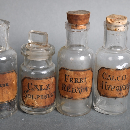 3013 - A group of six small corked apothecary bottles, each with period hand written paper labels, includin... 